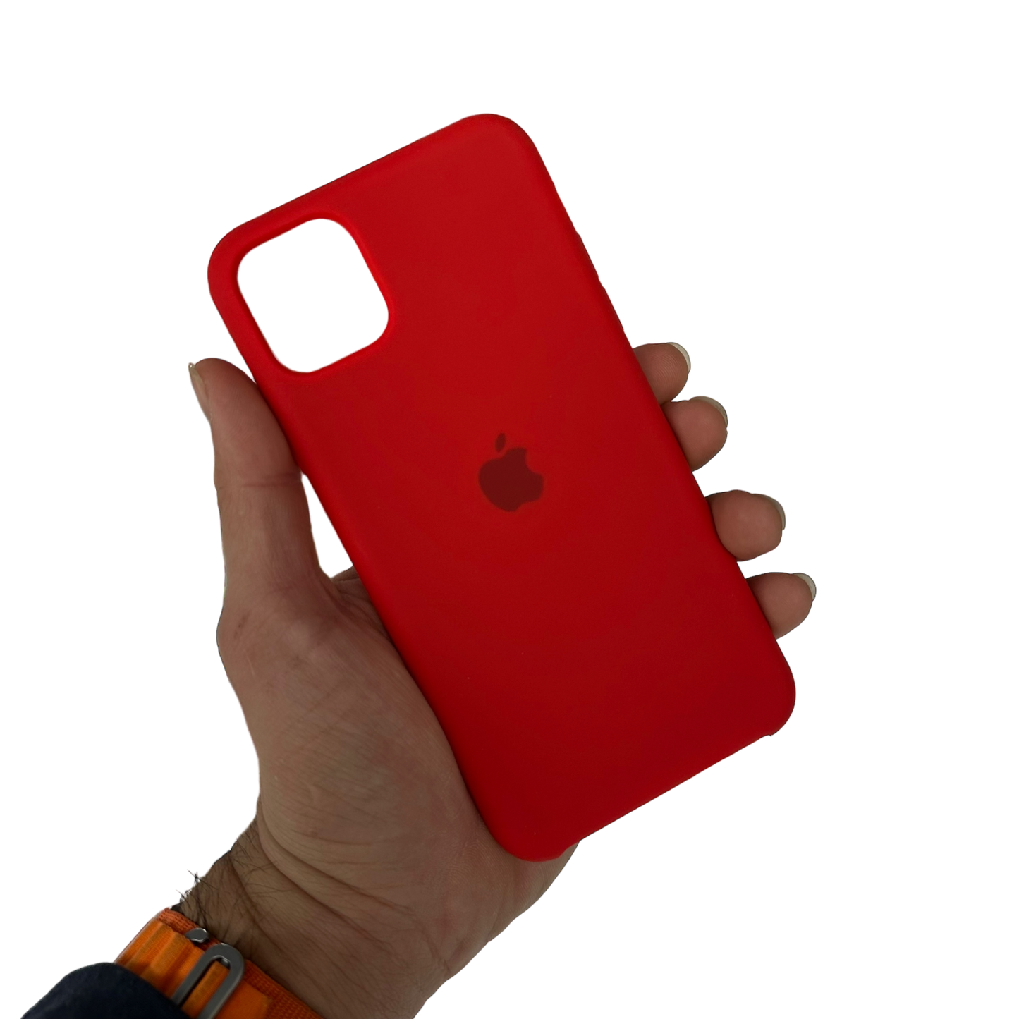 Carcasa de silicona en color rojo sostenida en una mano adulta