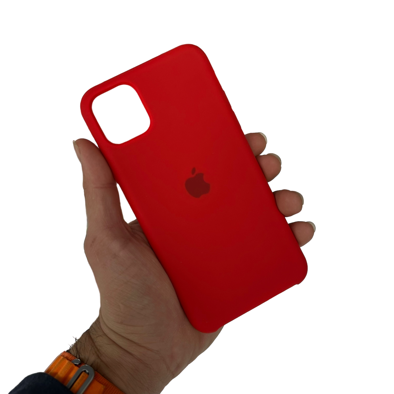 Carcasa de silicona en color rojo sostenida en una mano adulta