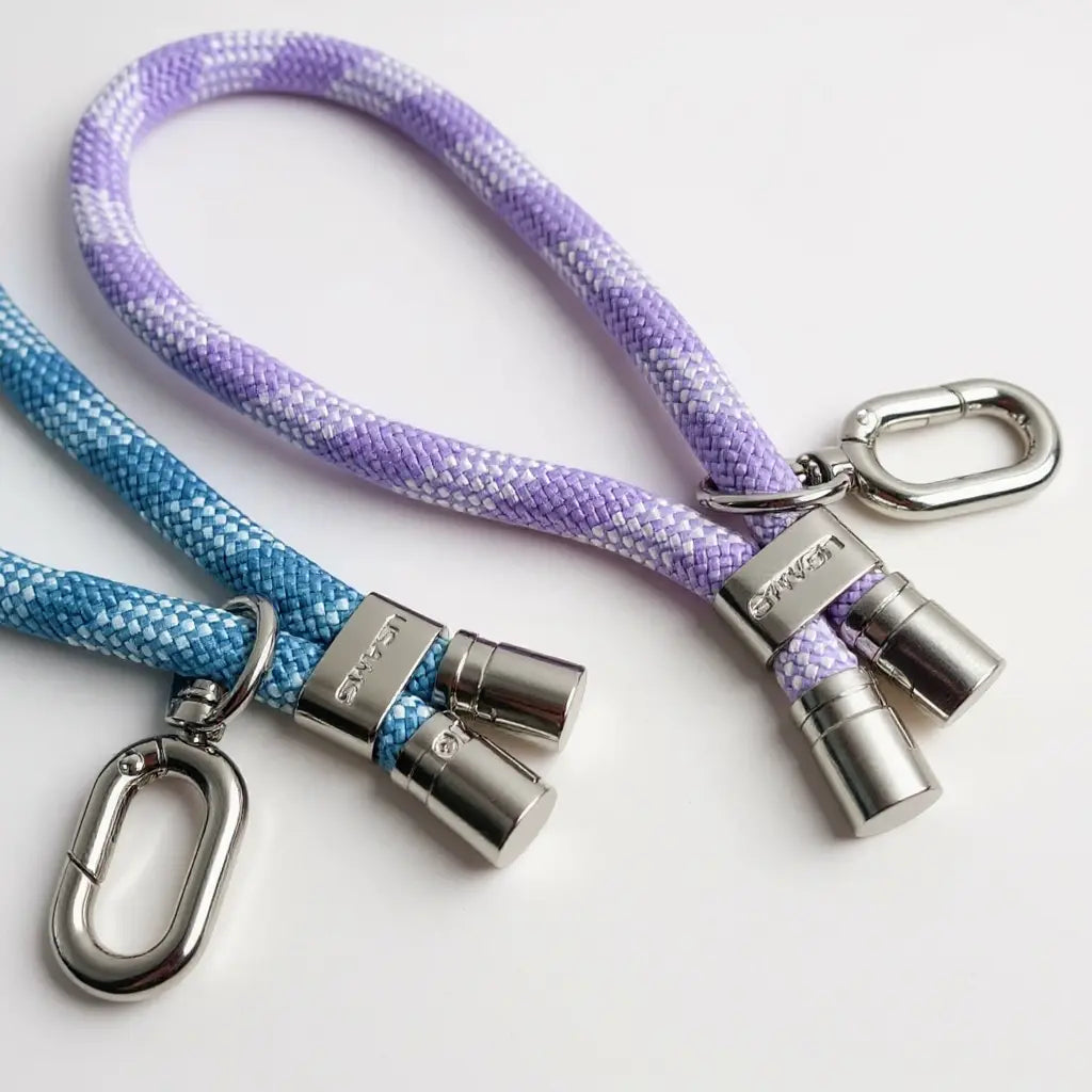 Detalles y materiales premium del lanyard de mano HandFit para celular