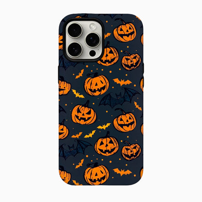Estampado Halloween retro de calabazas sonrientes y murciélagos naranjas y azul oscuro.