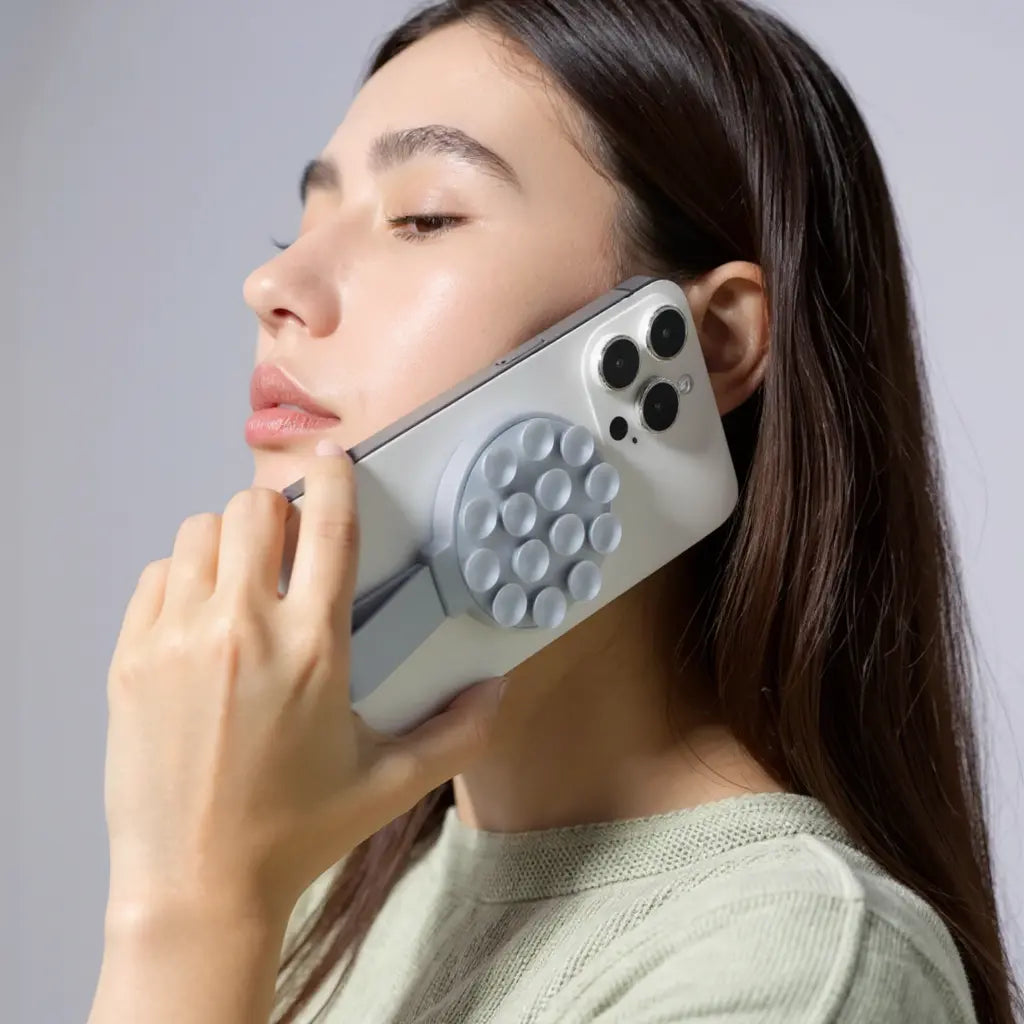 iPhone con Pop-Suction MagSafe - diseño de uso