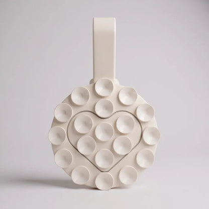 Soporte trasero con succión para iPhone - Adherencia por ventosas en color blanco